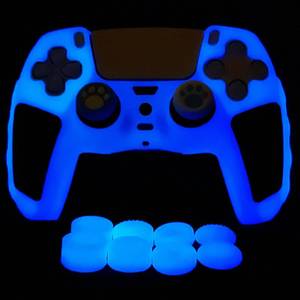 lot 7110 image: HLRAO Glow in The Dark PS5 Controller Skin,Blue Anti Slip Soft Thicked Studded Silicone Cover Skins Compatible with PS5 Controller,Include 8 PCS Blue Thumb Grips Glow and 2 Cat Paw Grips Accessories. - Retail $17