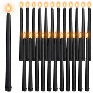 lot 7185 image: Macarrie 24 Packs Flameless Taper Candles Battery Operated Fake 11 Inch Long Candlelight LED Flameless Candlesticks Flickering Tapered for Spring Summer Wedding(Black) - Retail $30