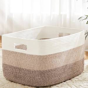 lot 7217 image: Artfeel Blanket Basket,Rectangle Woven Baskets for Storage,65L Laundry Basket for Decorative Nursery Blanket,Toys,Dirty Clothes and Magazine in Shelves,Baby Room,and Living Room - Retail $30