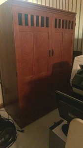 lot 1009 image: Craftsman Style Oak Wood desk Center 64x24x23 located in basement