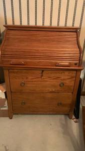 lot 1016 image: Solid Oak Roll Top Secretary Desk 46x36x24 located in basement