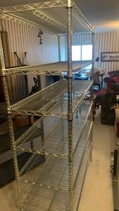 lot 1019 image: Chrome Wire Shelving Unit - 4 Tier Storage Rack 72x47x18 located in basement
