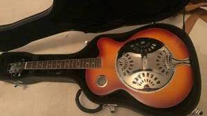 Zenison Resonator Guitar - Sunburst Finish located in basement