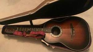 lot 1023 image: Ovation Celebrity Acoustic Guitar with Case located in basement