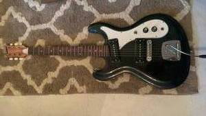 lot 1024 image: Univox Hi-Flier Electric Guitar located in basement