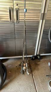 lot 2010 image: Four fishing poles