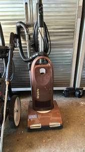 lot 2013 image: Simplicity Brown Upright Vacuum Cleaner