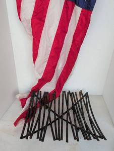 lot 2222 image: Tattered polyester American flag and decorative metal tray