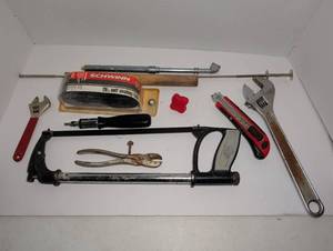 lot 2303 image: Tool Collection with bike Inner tube and hand saw