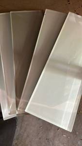 lot 2404 image: 4x12 Glass Wall Tiles - Grand Terrace Collection. Seven boxes and a few loose tiles - very nice
