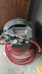 lot 3024 image: Coleman Powermate Premium Pancake Air Compressor with Hose