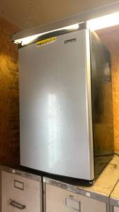 lot 3101 image: Magic Chef mini refrigerator 31x19x21 needs cleaning and taken down from a high shelf