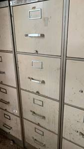 lot 3103 image: 1 Metal file cabinet 52x15x28 needs cleaning
