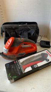 lot 3229 image: Black ad Decker sander and Corona razor tooth saw