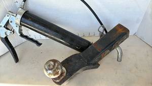 lot 3308 image: Grease gun and trailer hitch