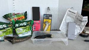 lot 3311 image: Plant fertilizer, keyless entry pad, oil spout, nozzle and more