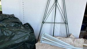 lot 3322 image: Christmas tree bag, plant holder and a tarp
