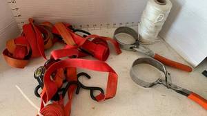 lot 3404 image: Tie straps , string and oil filter tools