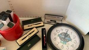 lot 3421 image: Wall clock, and cross pens