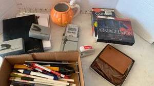 lot 3423 image: Books on tape and CD, pens, pads, and more