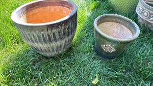 lot 4003 image: Two Ceramic Garden Planters 11 inches tall and 11 12 inches across9 inches tall and 9 inches across