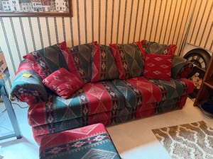 lot 1012 image: Southwestern Pattern Sofa with Matching Pillows 30x85x38 located in basement