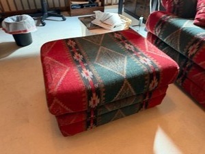 lot 1013 image: Southwestern Pattern ottoman 15x22x29 located in basement