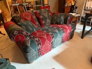 lot 1014 image: Southwestern Pattern Loveseat 41x68x40 located in basement