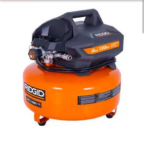 lot 16709 image: 6 Gal. 150 PSI Portable Electric Oil-Free Jobsite Pancake Air Compressor with Dual Pressure Gauges and 2-Quick Couplers - Retail $119