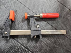 lot 16786 image: Bessey SGC2-506 6-Inch Steel Bar Clamp with Red Handle - Retail $25