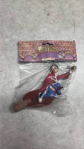 lot 1360 image: Harry Potter Quidditch Player Christmas Ornament