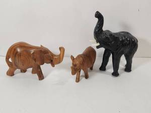 lot 155 image: Handcrafted Wooden Animal Figurines Collection with Black Elephant