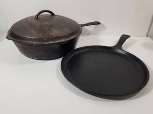 lot 214 image: Cast Iron Cookware Set with Covered Pot and Skillet