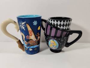 lot 234 image: Disney Character Ceramic Coffee Mug Set - Moana and Alice in Wonderland