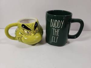 lot 237 image: Elf Movie Buddy the Elf Mug and Grinch Face Coffee Mug Set