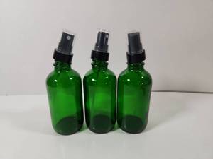 lot 266 image: Green Glass Spray Bottles with Black Pump Tops Set of 3 NEW