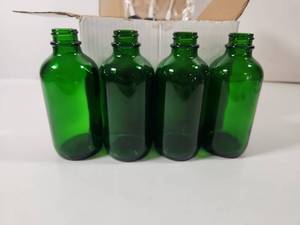 lot 267 image: Green Glass Bottles With Pumps