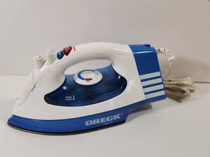lot 290 image: Oreck Cordless Steam Iron Blue and White