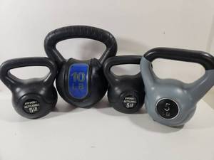 lot 301 image: Kettlebell Set - Mixed Weight Collection 5-10 lbs