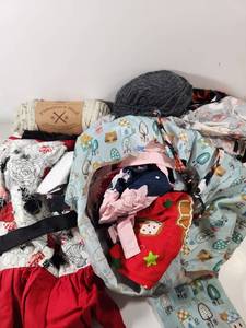 lot 319 image: Mixed Craft Supply Bundle with Fabric Scraps and Yarn