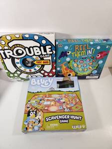 lot 333 image: Childrens Board Game Bundle - Trouble, Reel Them In, and Bluey Scavenger Hunt