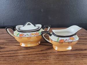lot 4380 image: Floral Pattern Sugar Bowl and Creamer Set