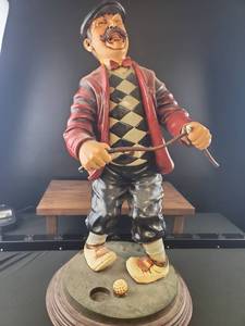 lot 4300 image: Golf Player Figurine with Putter and Golf Ball