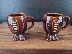 lot 4310 image: Football Shaped Ceramic Coffee Mugs Set of 2
