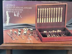 lot 3654 image: 65 Piece Gold Plated Grand Master Flatware Set