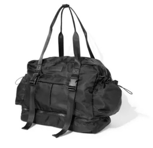 lot 2588 image: Blogilates Black Multi-Pocket Travel Duffel Bag with Yoga Mat Holder - Retail $45