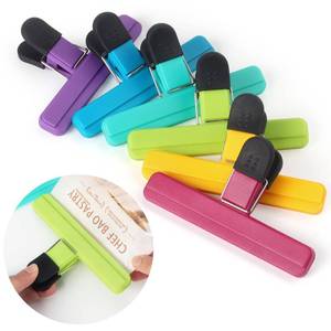 lot 45898 image: Tamaki 4 Pack Large Chip Bag Clips Assorted Color Food Bag Clips Plastic Heavy Duty Seal Grip, 6 x 3.5 Inch - Retail $10
