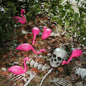 lot 3087 image: 15 Pcs Halloween Skeletons Flamingo Yard Decorations Pink Flamingo Eating Skeleton Outdoor Decor 17 Includes 6 Yard Lawn Ornament 9 Plastic Skeleton Head Bones for Halloween Garden
