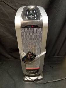 lot 1047 image: Lasko Ceramic Tower Space Heater with Remote Control - Retail $45