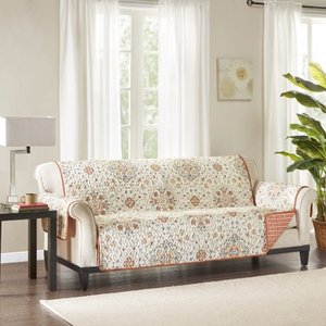 lot 1109 image: Home Essence Neda Printed Reversible Sofa Protector - Retail $110